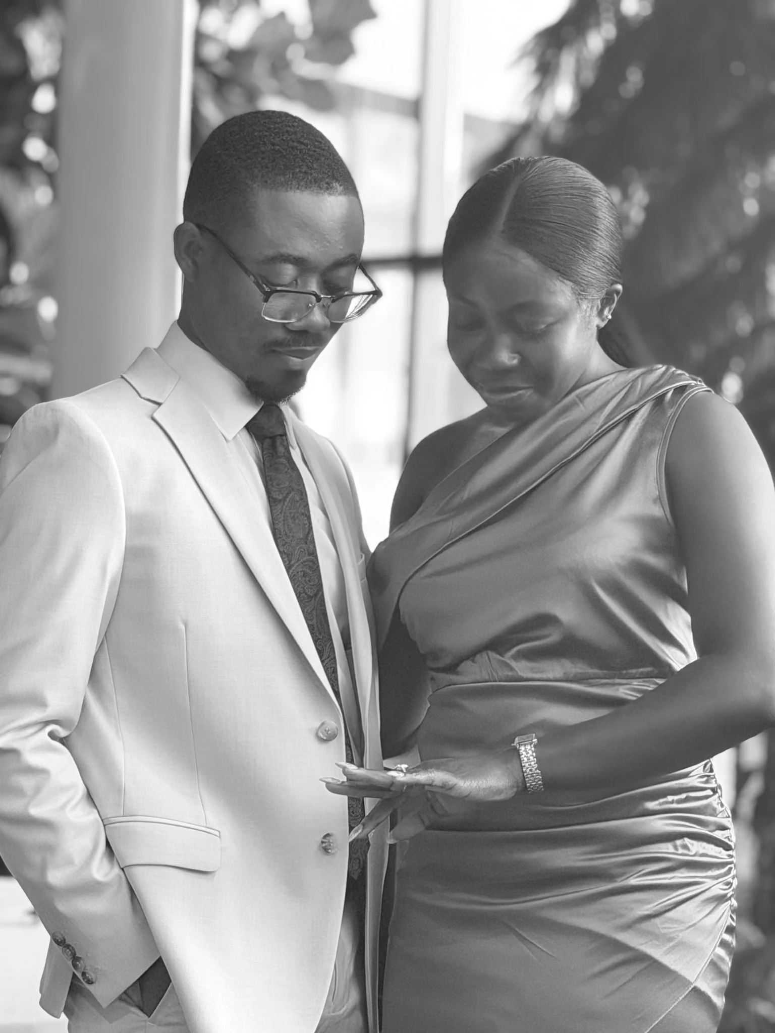 A black and white portrait of Frederick and Veronica sharing a quiet moment